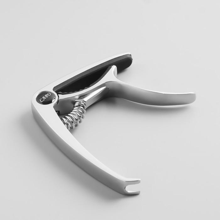 Каподастр гитарный, серебристый Каподастр гитарный, серебристый