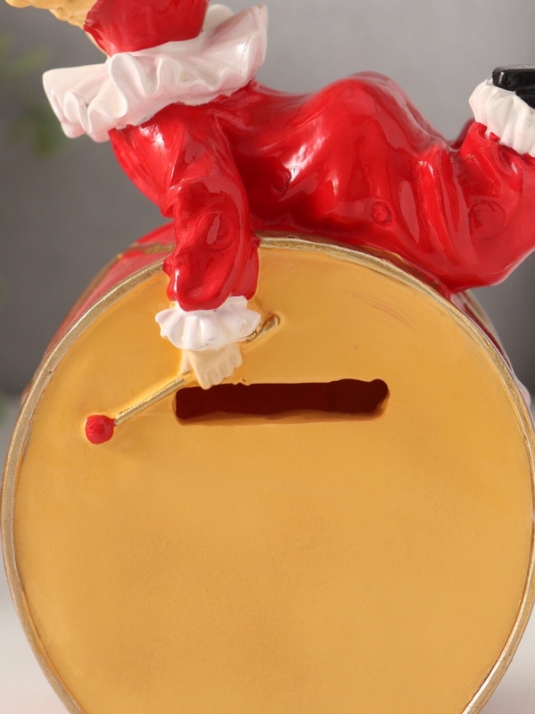 Копилка полистоун "Клоун лежит на барабане" красно-белый 13,5х7,5х20 см