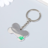 Брелок металл "Косточка с лапкой" МИКС 3х4 см Брелок металл "Косточка с лапкой" МИКС 3х4 см