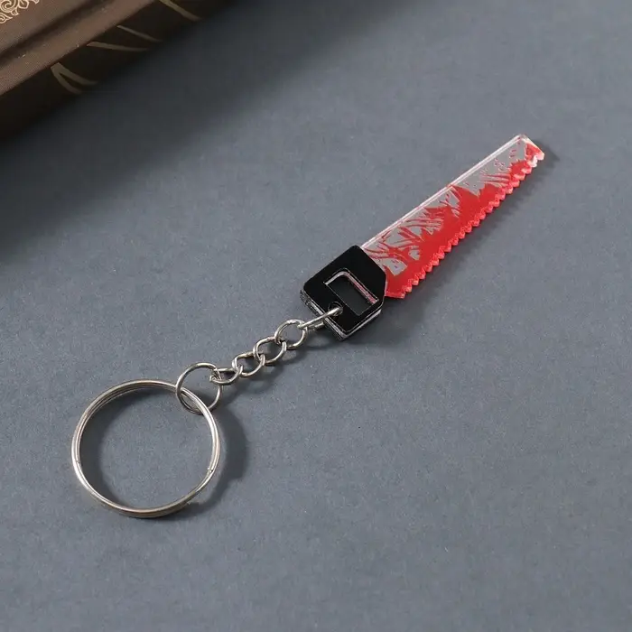 Брелок акрил зеркальный "Окровавленная пила" 5,1х1,3х0,3 см