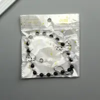 Брелок на карабине "Бант и сердце" черно-белый 14,5 см