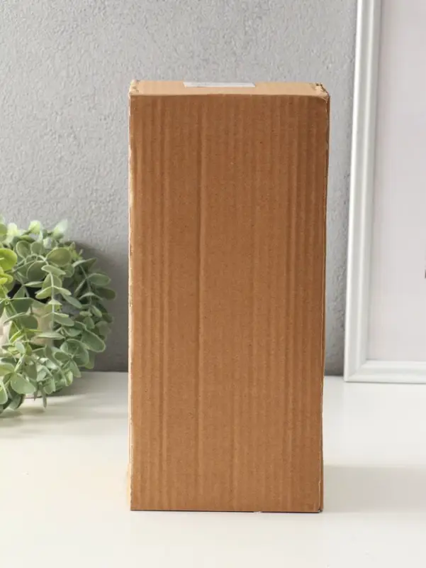 Сувенир полистоун "Папа, мама и малыш в вязанных нарядах, под зонтом" 8,5х9,5х25,5 см