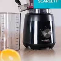 Соковыжималка электрическая шнековая