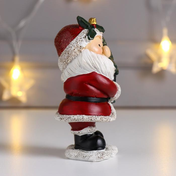 Сувенир полистоун "Дед Мороз в красной шубе, с ёлочкой" 10,5х5,5х7 см