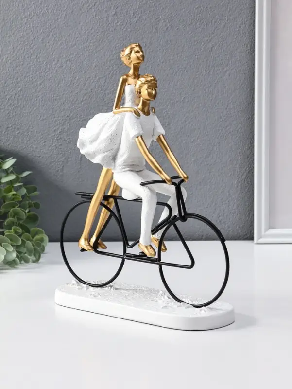 Сувенир полистоун "Парочка на велосипеде" бело-золотой 8,5х23х29 см