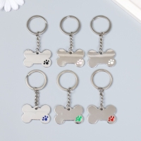 Брелок металл "Косточка с лапкой" МИКС 3х4 см Брелок металл "Косточка с лапкой" МИКС 3х4 см