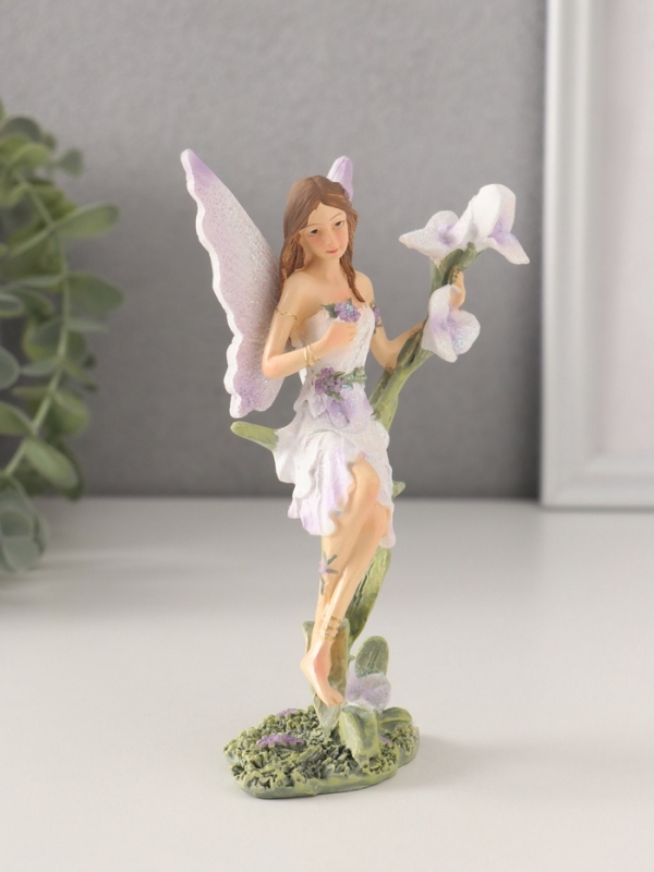 Сувенир полистоун "Девушка-фея в сиреневом платье на цветке" 7,5х6х14 см