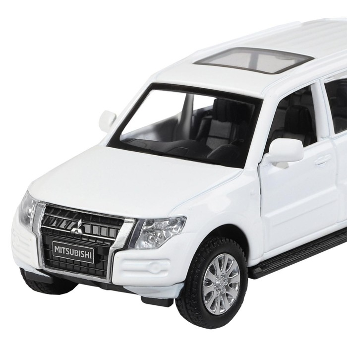 Машина металлическая Mitsubishi Pajero 4WD Turbo 1:43, инерция, открываются двери, цвет белый