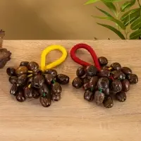 Сувенирный музыкальный инструмент "Погремушка" орех кемири, 16х10х3 см, МИКС