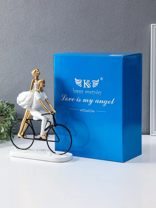 Сувенир полистоун "Парочка на велосипеде" бело-золотой 8,5х23х29 см