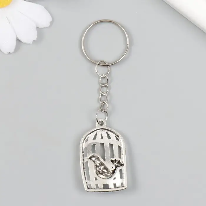 Брелок металл "Птица у клетки" серебро 2,2х3,6 см