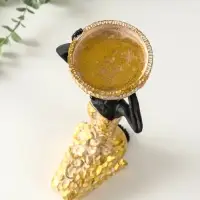 Подсвечник полистоун "Африканка в косынке с цветами" золото d=8 см 14х15х27,5 см