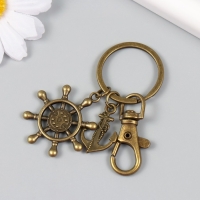 Брелок металл с карабином "Якорь и штурвал" бронза 7 см Брелок металл с карабином "Якорь и штурвал" бронза 7 см