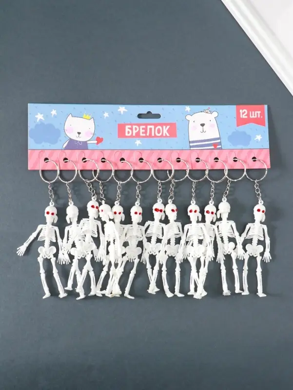 Брелок пластик "Скелет в бандане" белый 10х3,5х1 см