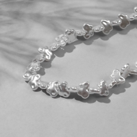 Бусины пластиковые на нити &laquo;Бабочка&raquo; 1&times;0,7&times;0,3см, (набор 110 шт.), цвет белый