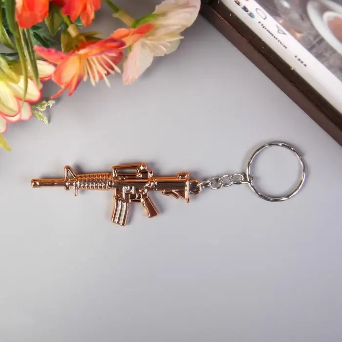 Брелок пластик под металл "Автомат" 2,5х7 см