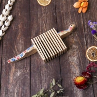 Сувенирный музыкальный инструмент "Трещотка крокодил пятнистый" дерево 4x27x9 см МИКС