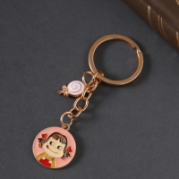 Брелок металл, эмаль "Девочка и леденец" 9 см