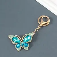 Брелок металл, стразы на карабине "Бабочка" голубой 4,7х6,4х0,8 см