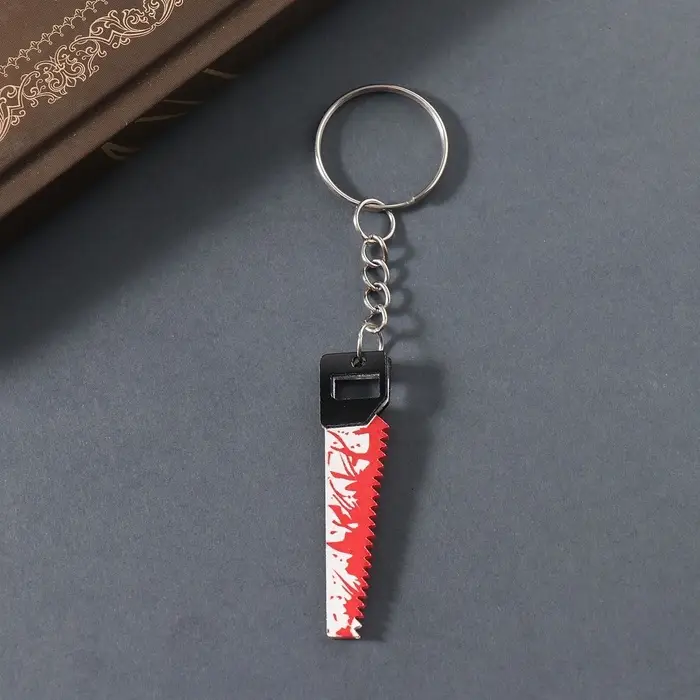 Брелок акрил зеркальный "Окровавленная пила" 5,1х1,3х0,3 см