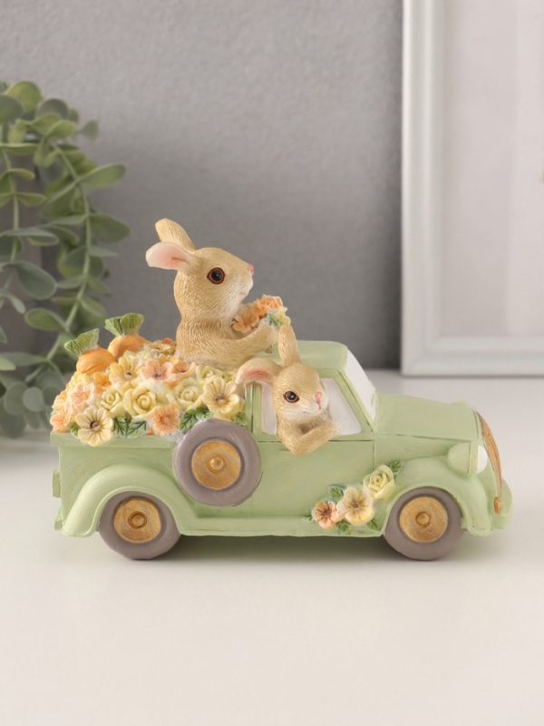 Сувенир полистоун "Зайчики в грузовике с цветами и морковью в кузове" 16х7,5х11,5 см