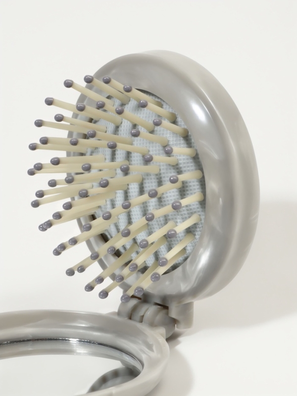 Расческа массажная складная круг МРАМОР d7/7,5*7*2,5см пластик серый пакет QF