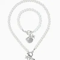 Набор 2 пред-та: бусы.браслет "Жемчуг", ракушка вонголе, цвет белый в серебре L=18/42см №8   1093654