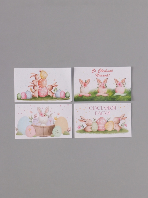 Наклейка бумага "Пасхальные кролики" 3х5 см 200 шт в рулоне