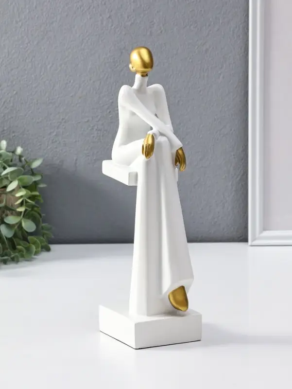 Сувенир полистоун "Стильная девушка на стуле" белый с золотом 7,5х10,5х29,5 см
