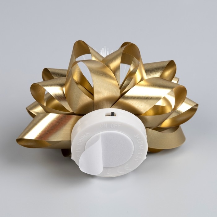 Светодиодная игрушка «Бант-звезда» 9 × 6 × 9 см, батарейки LR44х3 (в комплекте), свечение мульти, золотистая Светодиодная игрушка «Бант-звезда» 9 × 6 × 9 см, батарейки LR44х3 (в комплекте), свечение мульти, золотистая