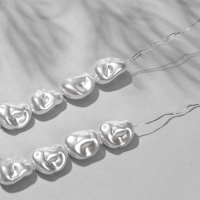 Бусины пластиковые на нити «Жемчуг» бобы 1,1×1,5×0,6 см, (набор 70 шт.), цвет белый Бусины пластиковые на нити «Жемчуг» бобы 1,1×1,5×0,6 см, (набор 70 шт.), цвет белый