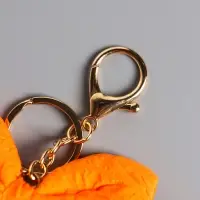 Пушистик на кольце "Чучундра с бантиком" салатовая 18х10х5 см