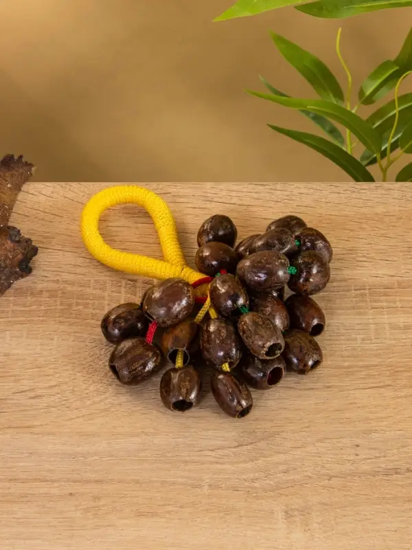 Сувенирный музыкальный инструмент "Погремушка" орех кемири, 16х10х3 см, МИКС