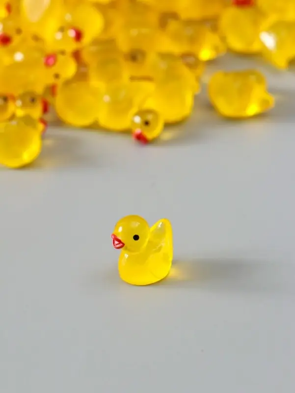 Сувенир полистоун флюоресцентный "Уточки" набор 100 шт 1,5х1,5 см