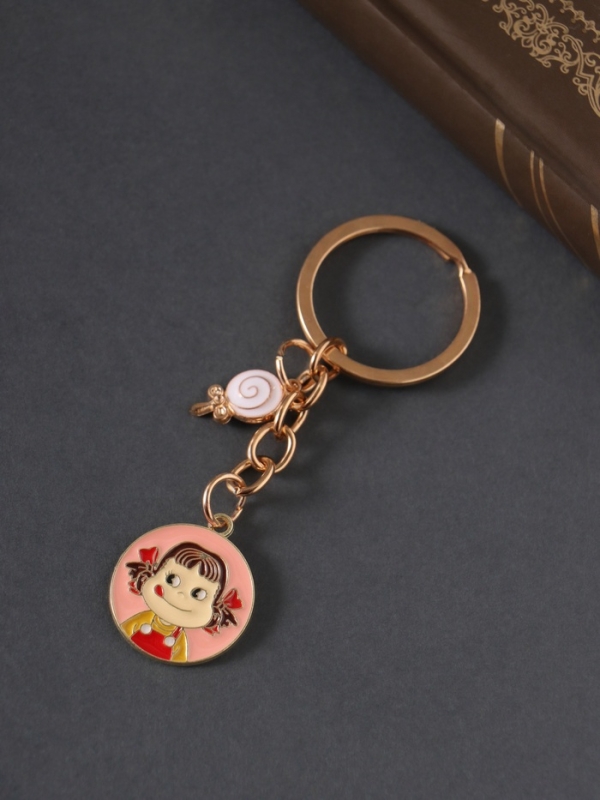 Брелок металл, эмаль "Девочка и леденец" 9 см