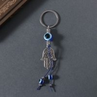 Брелок от сглаза металл "Глаз Назара в руке Фатимы" 2,7х9 см Брелок от сглаза металл "Глаз Назара в руке Фатимы" 2,7х9 см