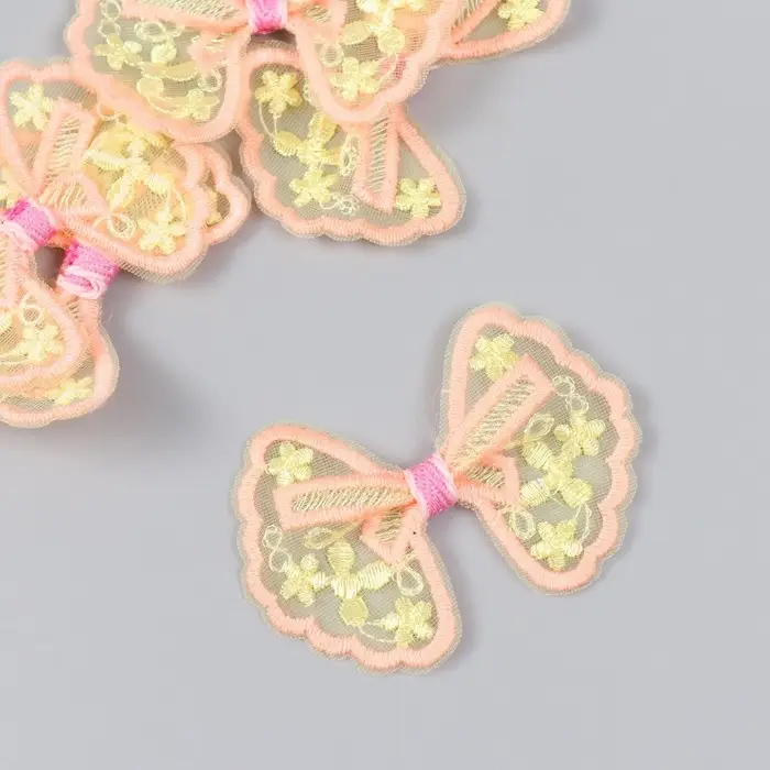 Декор для творчества текстиль вышивка "Бантик в цветочках оранжево-жёлтый" 7х5,5 см