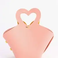 Кожанная подарочная сумочка 10,5 х 5 х 6 см розовая