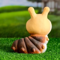 Садовая фигура "Гусеница улыбка" 9х14х17см Садовая фигура "Гусеница улыбка" 9х14х17см