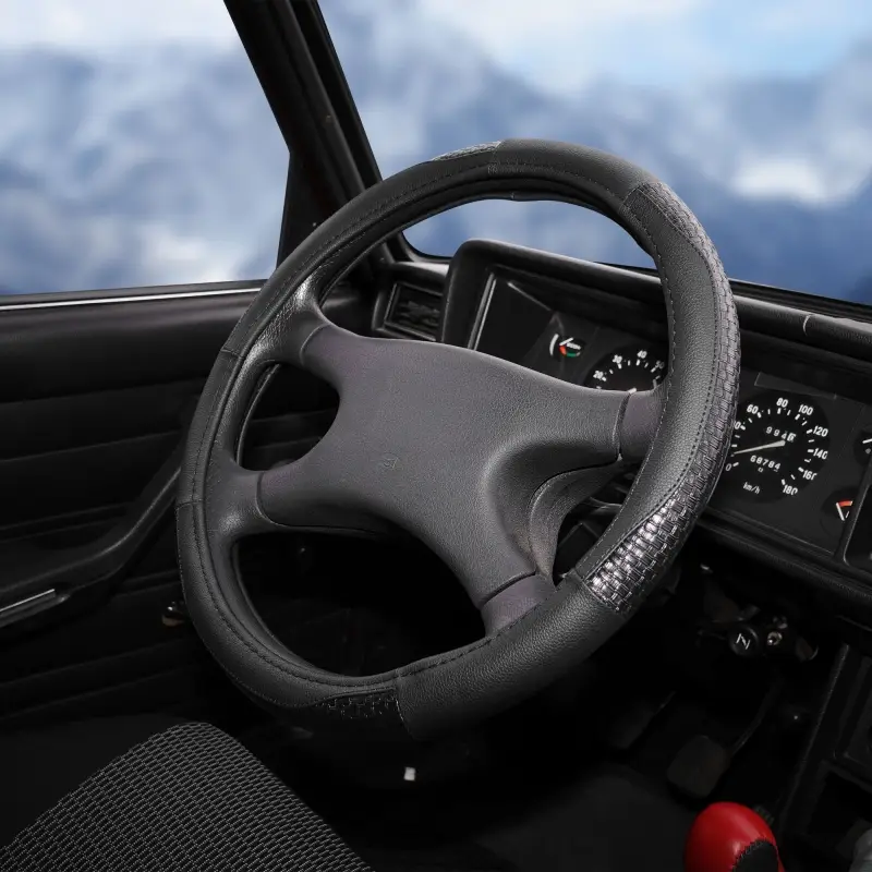 Оплетка на руль, искусственная кожа с тиснением, черная, 42 см / XL