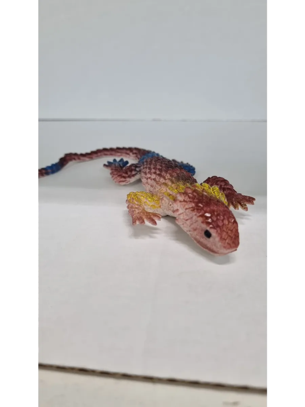 Антистресс игрушка ящерица золотистая