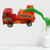 Инерционный экскаватор с ковшом