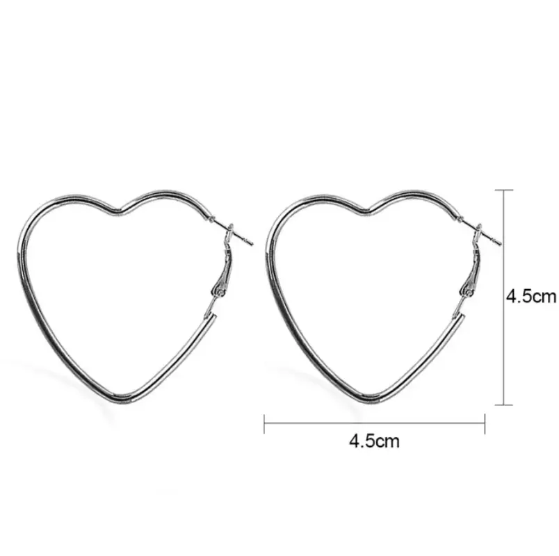 Серьги кольца в форме сердце серебряные