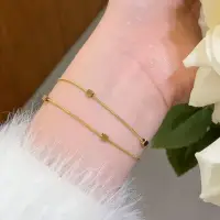 Браслет тонкий с кубиками золотистый