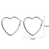 Серьги кольца в форме сердце серебряные