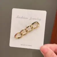 Брошь Звенья золотистая