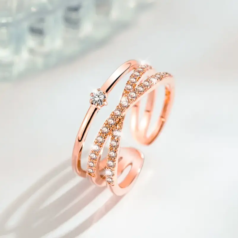 Кольцо двойное с кристаллами розовое золото