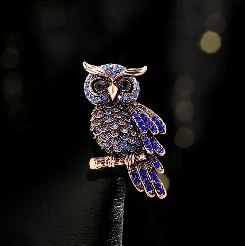Брошь Сова с голубыми и синими камнями