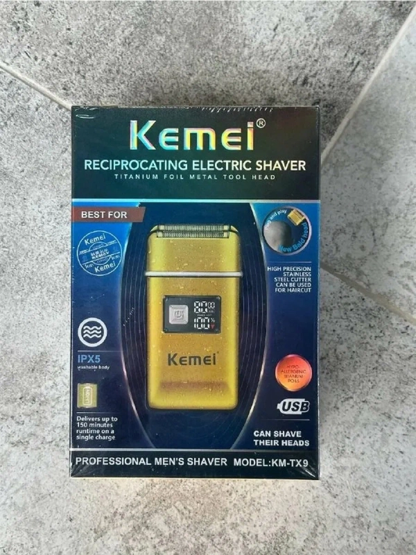 Электробритва с выдвижным триммером KM-TX9